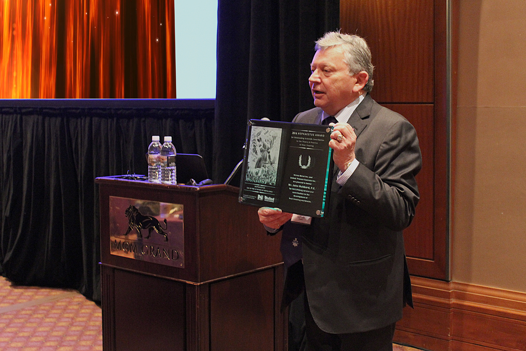 Chairman Michel Korwin Presents Hephaestus Award to Mr. John Hubbard at Nitriding Symposium 4 (NS4)